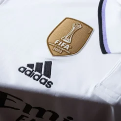 Adidas Real Madrid Home Trikot Inkl. FIFA Club World Champions Logo 2022-2023 -Puma Verkäufe 9319c68ca2566007fa9371e896165e1c0a0020ea0823137faa183f1caef63df8