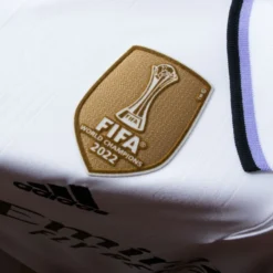 Adidas Real Madrid Home Trikot Inkl. FIFA Club World Champions Logo 2022-2023 -Puma Verkäufe c1fbe9647cc62891ba5b2528a47f9e63f8a09662ae01cbbc81f49e20acb69fc0